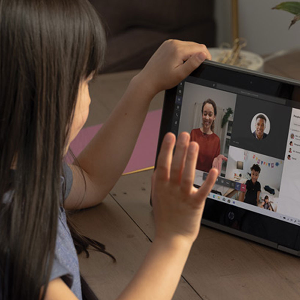 child using mobile device at home