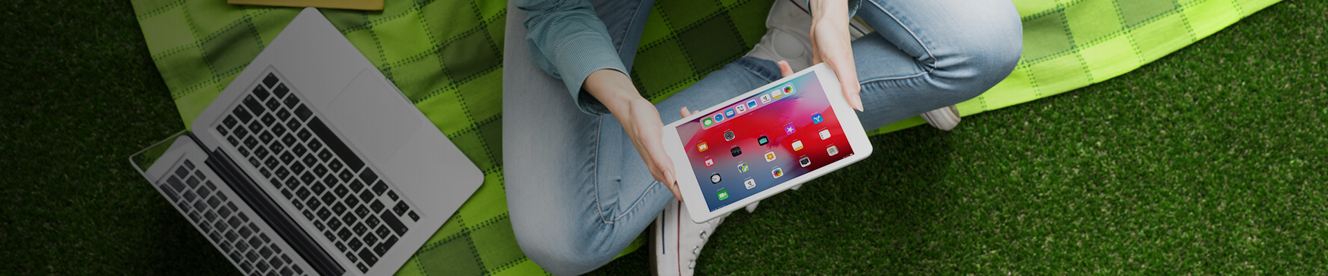 Young pupil using tablet in classroom